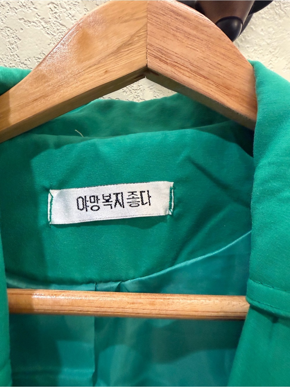 Size 2. Green Double-Breasted Trench Coat. Navy accented pockets. Silver buttons - Picture 3 of 13
